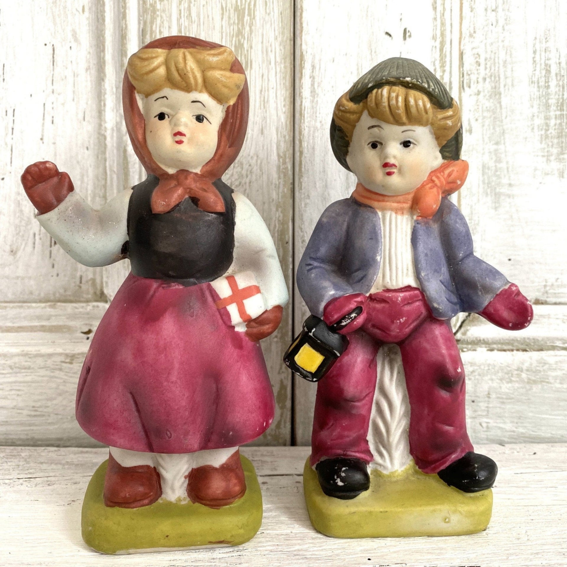 vintage bisque figurines boy with lantern and girl with gift 1950s-vintage-Figurines-SweetAntik